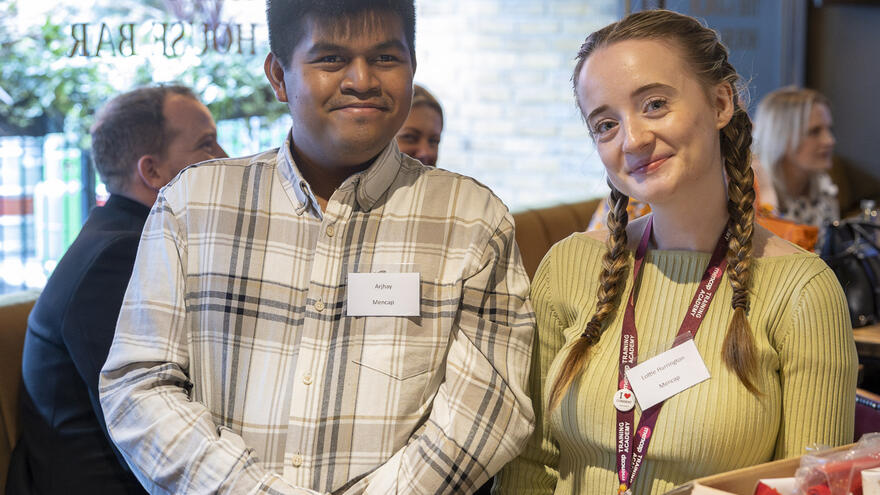 Supported internship learner, Arjhay with a Mencap Training Academy skills coach.