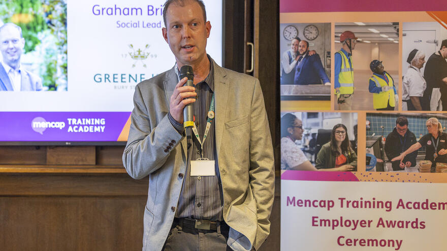 Greene King's Social Lead, Graham Briggs giving a speech at the 2025 MTA Employer Awards.